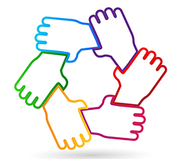 Farbige Hände schliessen sich zu einem Kreis zusammen.